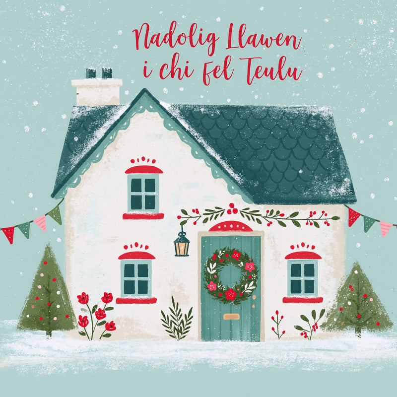 Nadolig Llawen i Chi Fel Teulu — Bwthyn Nadolig / Welsh card featuring a cottage decorated with a wreath, bunting and red flowers