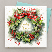 Cerdyn “Nadolig Llawen” gyda torch o gelyn ac aeron â rhuban coch, yn gorwedd yn fflat gydag amlen laswyrdd / Welsh Christmas card with a holly and berry wreath with a red ribbon