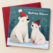 Cerdyn Nadolig Mab a Merch yng Nghyfraith – Eirth / Welsh Christmas card with two polar bears in Christmas hats, lying flat beside a deep red envelope.