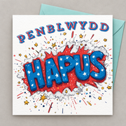 Cerdyn pen-blwydd gyda geiriau comic coch a glas gyda sêr, yn gorwedd yn fflat gydag amlen laswyrdd
